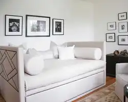 In the bedroom instead of a bed there is a sofa photo of the interior