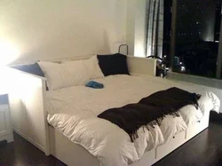 In the bedroom instead of a bed there is a sofa photo of the interior