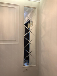 Mirror with bevel in the hallway interior