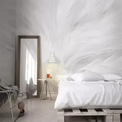 Bedroom interior with photo wallpaper feathers