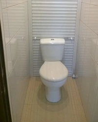 Roller shutters in the bathroom interior photo