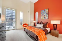 Orange color in the bedroom interior