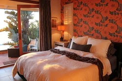 Orange color in the bedroom interior