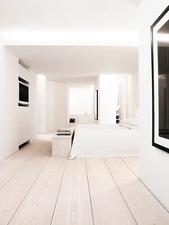 Photo of a bedroom with white laminate