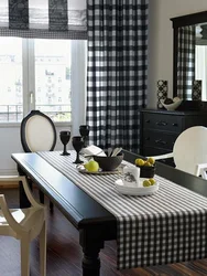 Black curtains in the kitchen interior