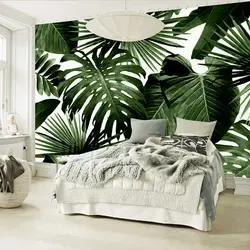 Wallpaper with leaves in the bedroom interior