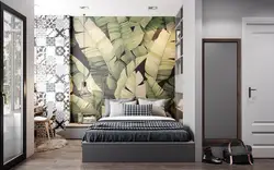 Wallpaper with leaves in the bedroom interior
