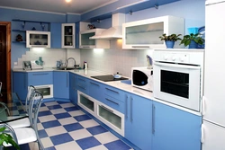 Gray blue kitchen with white photo