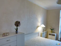 Decorative plaster silk photo in the living room interior
