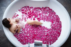 Bath with roses and foam photo