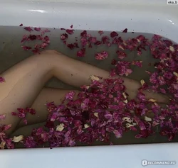 Bath with roses and foam photo