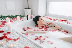 Bath with roses and foam photo