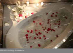 Bath with roses and foam photo