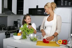 Photo of mom at home in the kitchen