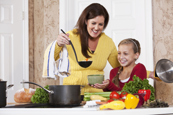 Photo of mom at home in the kitchen