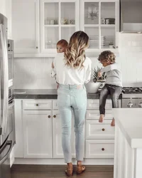 Photo of mom at home in the kitchen