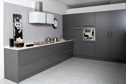 Dark gray kitchen with white photo