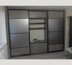 Sliding Wardrobes With A Niche For A TV In The Bedroom Photo
