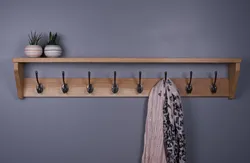 Do-it-yourself wall-mounted clothes hanger for the hallway photo