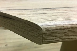 Oak ceramic countertop in the kitchen interior photo
