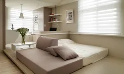 Sofa in a small bedroom instead of a bed interior photo