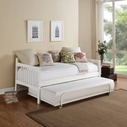 Sofa in a small bedroom instead of a bed interior photo