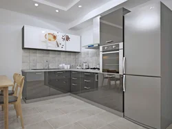 White kitchen with gray refrigerator photo