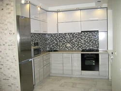 White kitchen with gray refrigerator photo