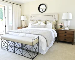 Nightstands near the bed in the bedroom photo
