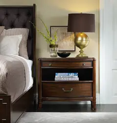 Nightstands near the bed in the bedroom photo