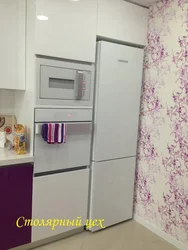 Kitchen design with pencil case and refrigerator photo