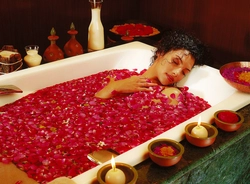 Photo With A Bath With Rose Petals