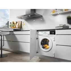 Kitchen with vertical washing machine photo