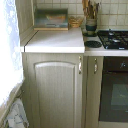 Kitchen with vertical washing machine photo