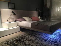 Floating bed in the bedroom interior