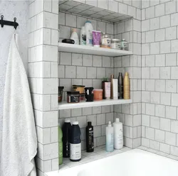 Design of shelves in the bathroom made of tiles photo