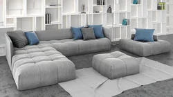 Modern sofa in the living room with a sleeping place photo