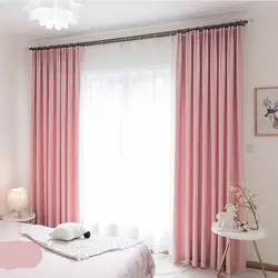 Dusty rose curtains in the bedroom interior