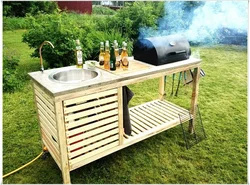 DIY kitchen made of wood for a summer residence ideas photo