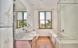 Interior Of A Bathroom With A Toilet In A House With A Window