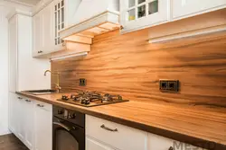 Kitchen design with wooden splashback