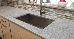 Countertop made of artificial stone in the kitchen interior