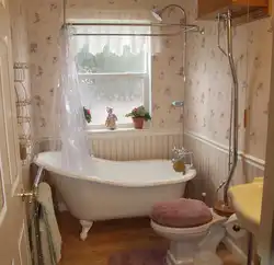 Old bathtub in the apartment photo