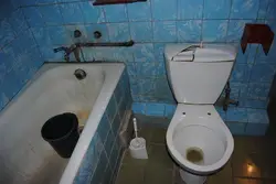 Old bathtub in the apartment photo