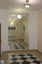 Mirror Panel On The Entire Wall In The Hallway Photo