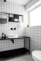Hammom oq plitkalar qora grout fotosurati