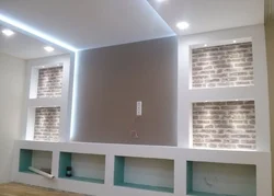 Oturma otağında alçıpan divar fotoşəkili nişlər