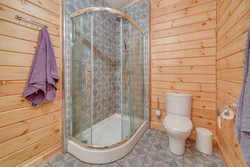 Bathroom with shower in a country house in a wooden house photo