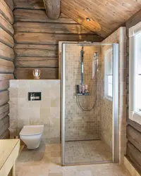 Bathroom with shower in a country house in a wooden house photo