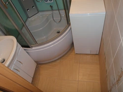 Shower cabin in the bathroom of a panel house photo
